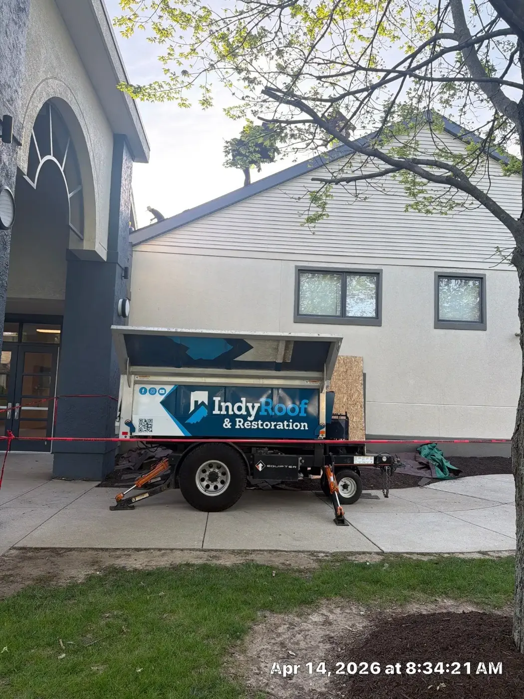 Tarping and dry-in on a Camby commercial roof