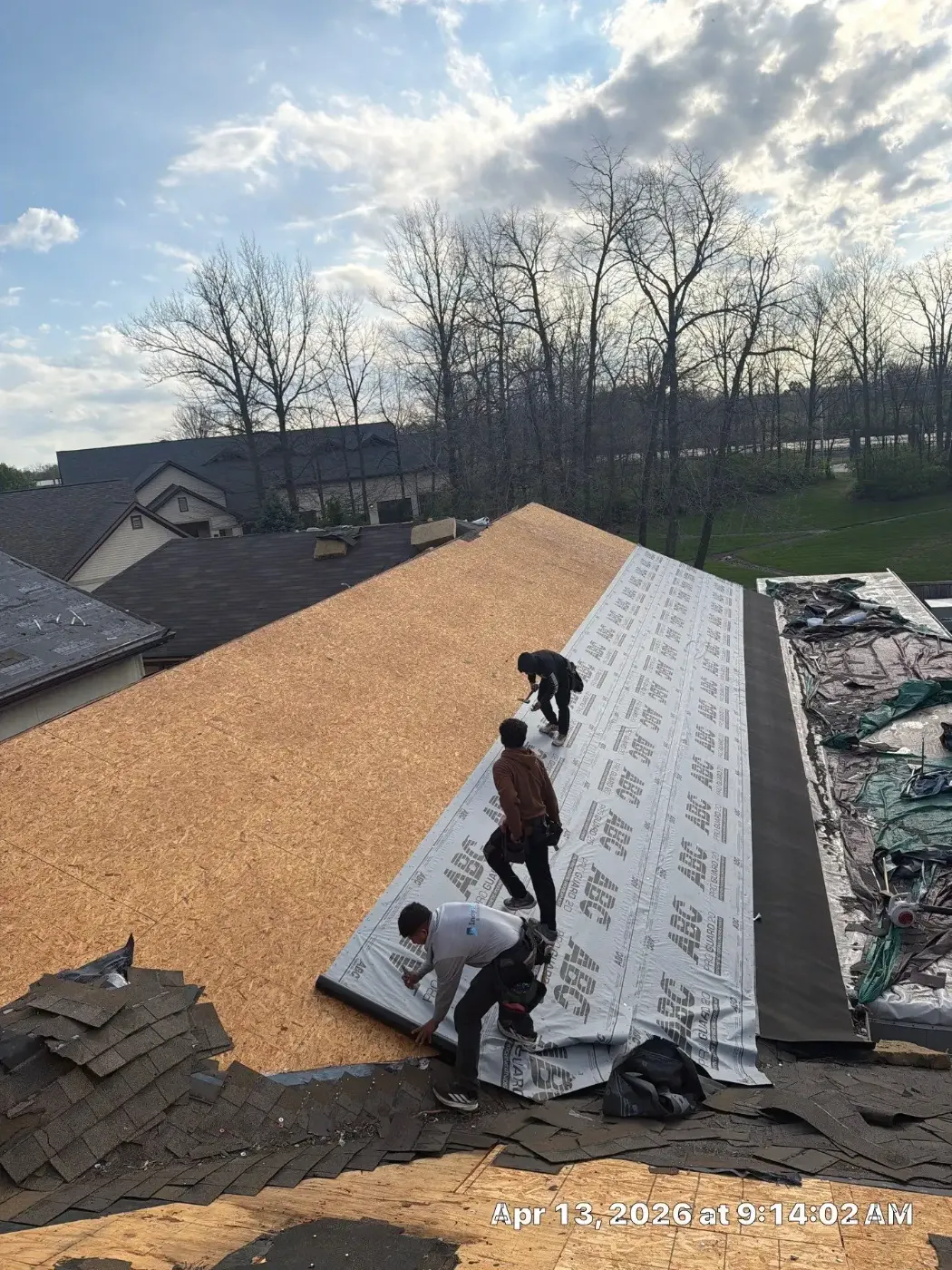 Tarping and dry-in on a Camby commercial roof